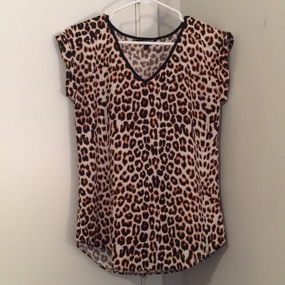 XS Express Cheetah print short sleeve shirt.